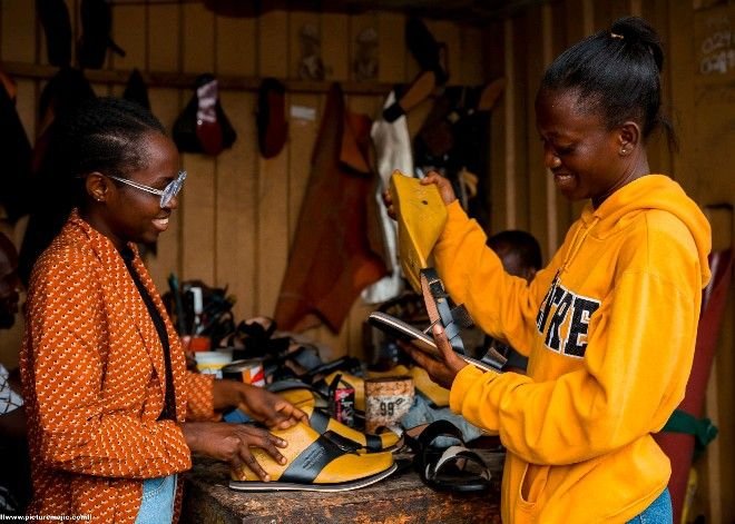 Edna Frimpong, co-Founder of Ahofade, making shoes at her workshop.