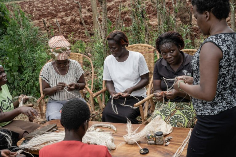 Women weaving jewelries with banana fibre