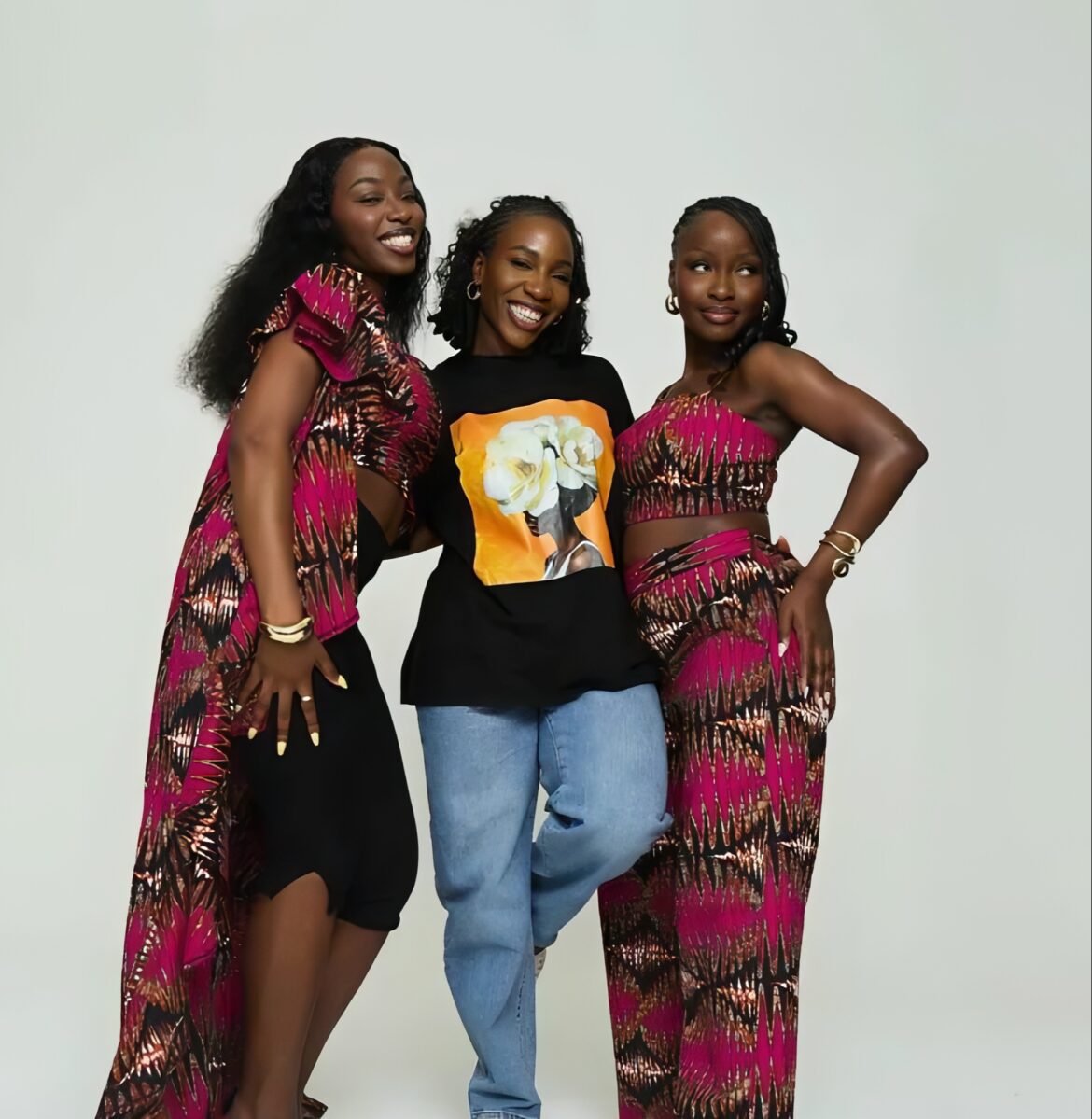 Michelle Nganhou, co-founder of Grass-Fields and two models.